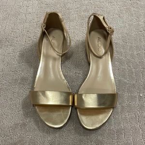 Also gold sandals